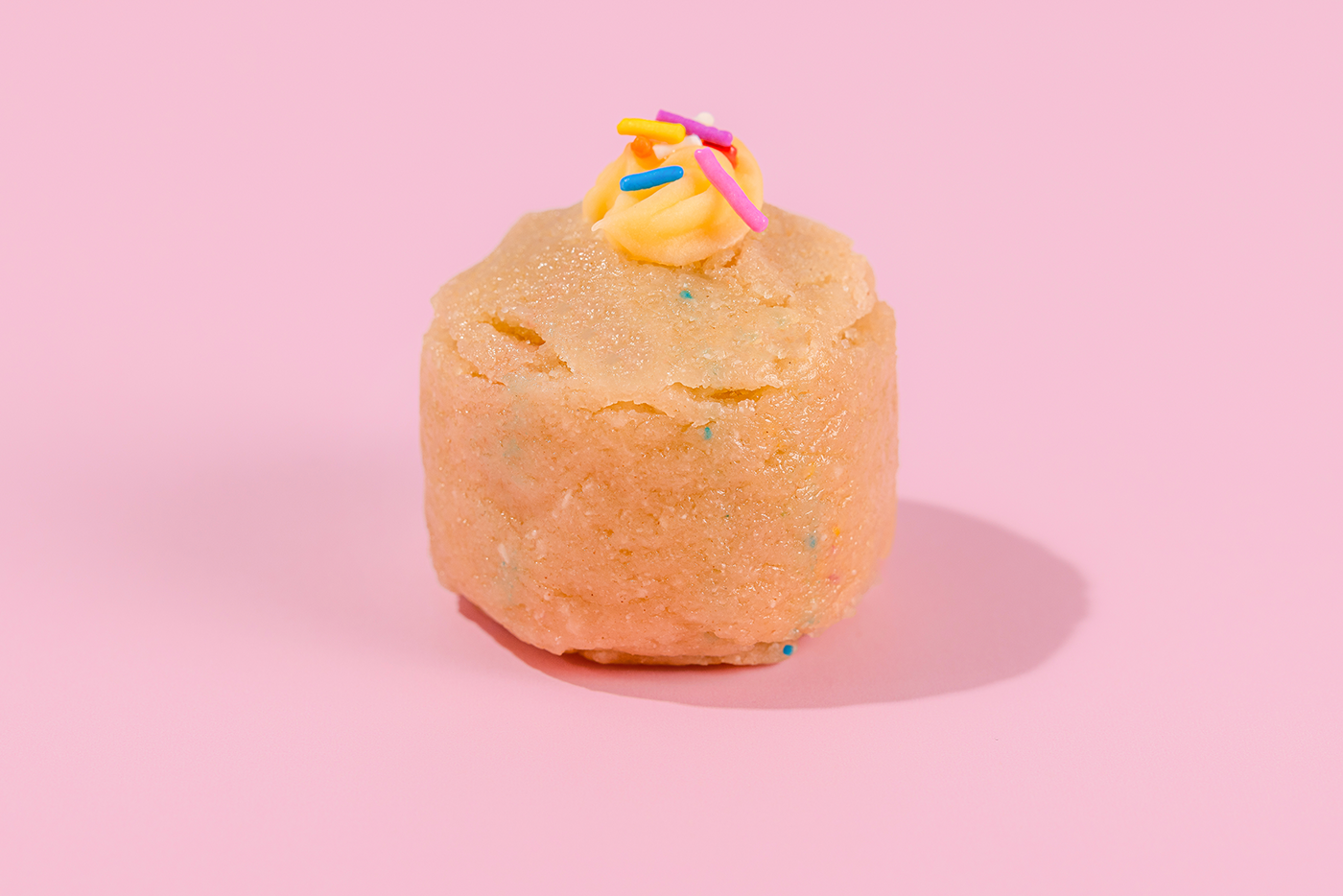 Probites Birthday Cake — single bite on pink