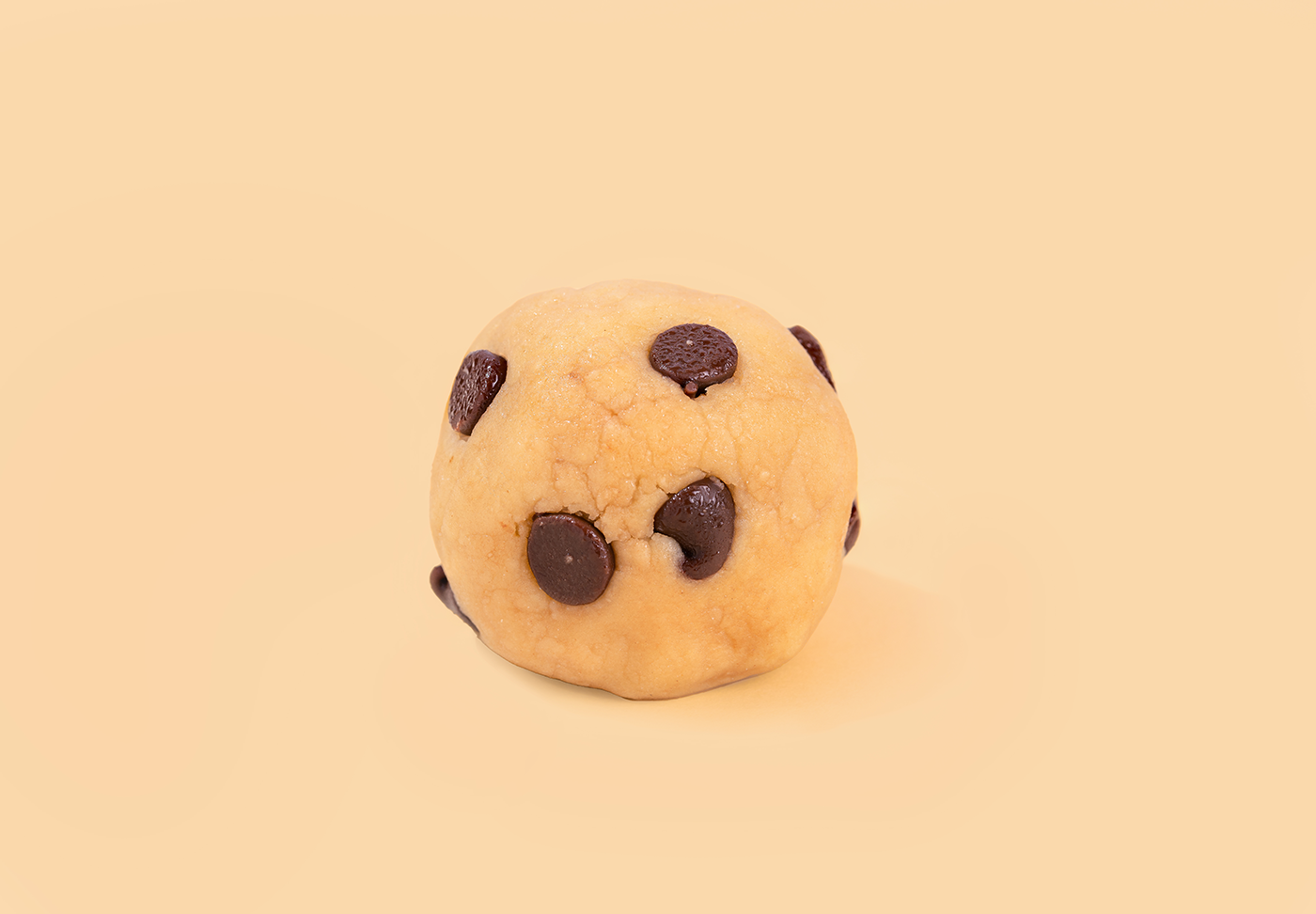 Probites Cookie Dough — single bite on beige