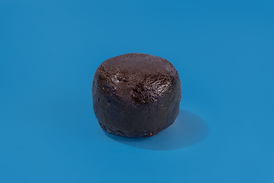 Probites Cookies & Cream — single bite on blue