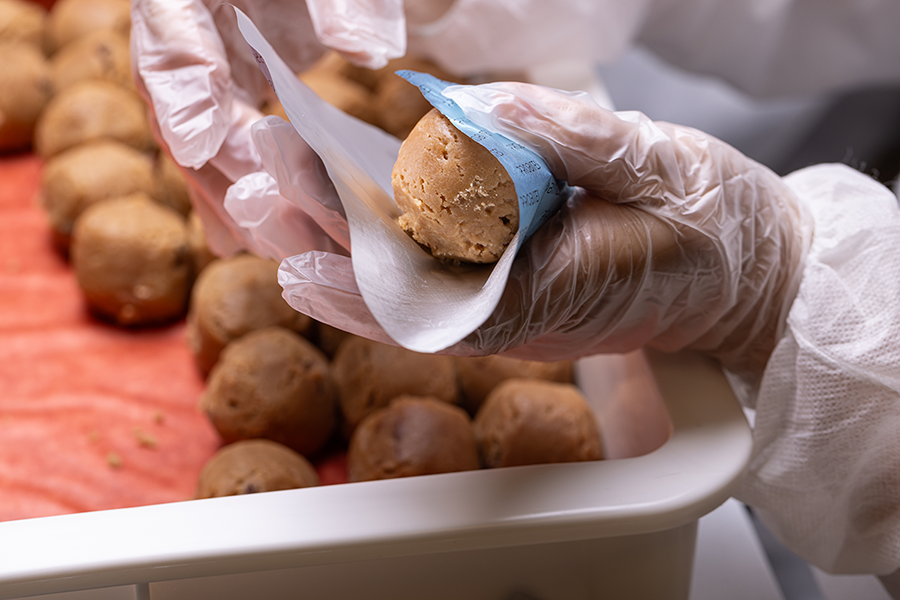 Probites Craft & Process — wrapping cookie dough bite in blue foil