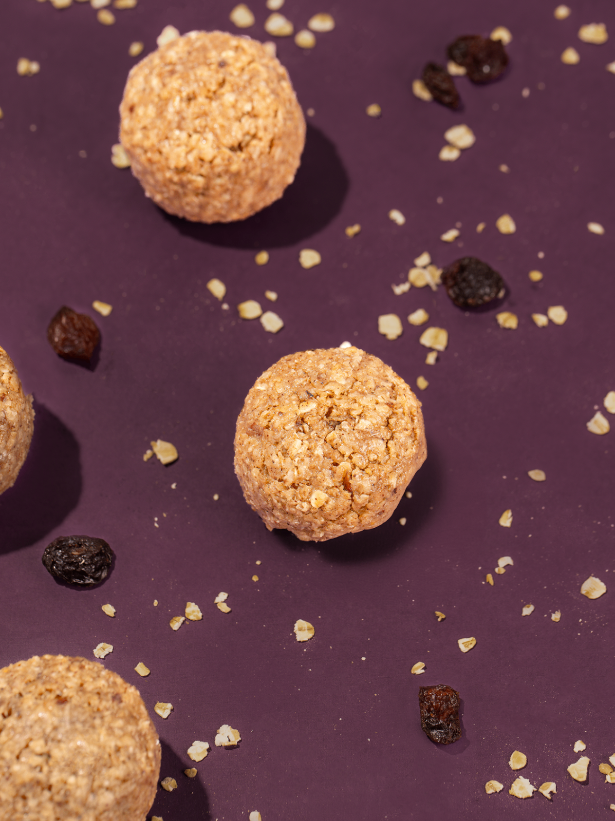 Probites Oatmeal Raisin — overhead with oats and raisins