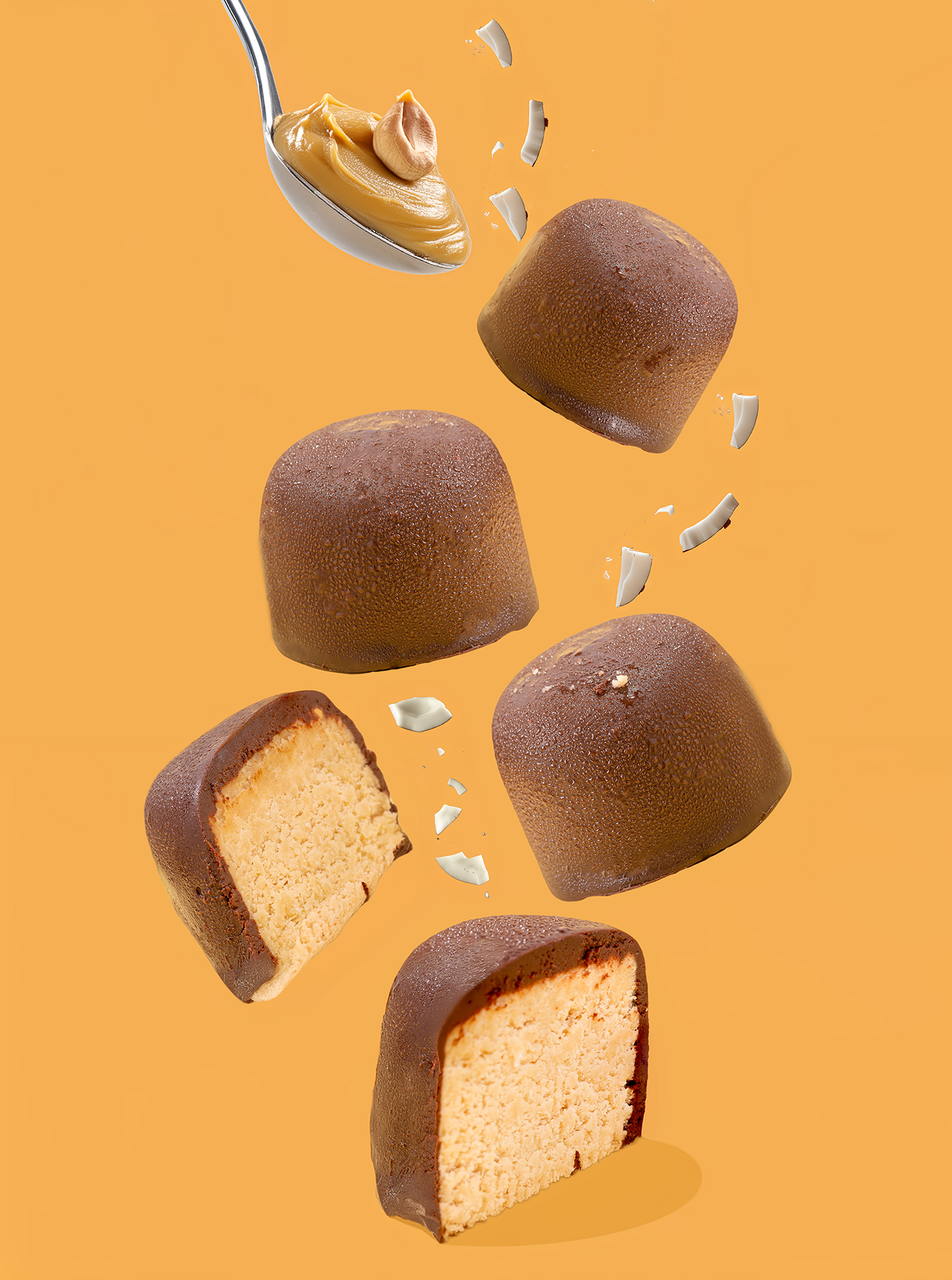 Probites Peanut Butter Coconut — falling bites with peanut butter spoon and coconut