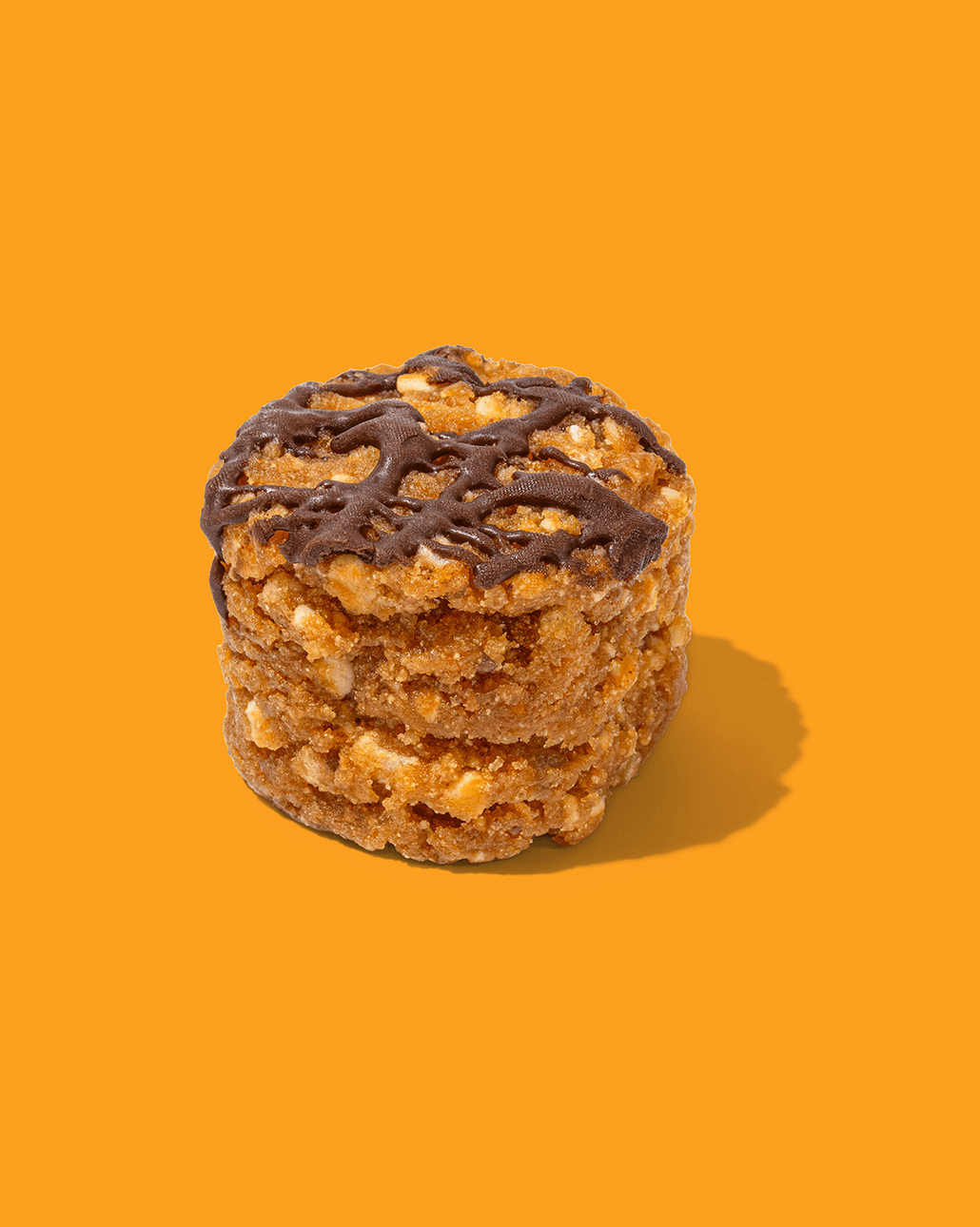 Probites Peanut Butter Crunch — stacked bites on orange