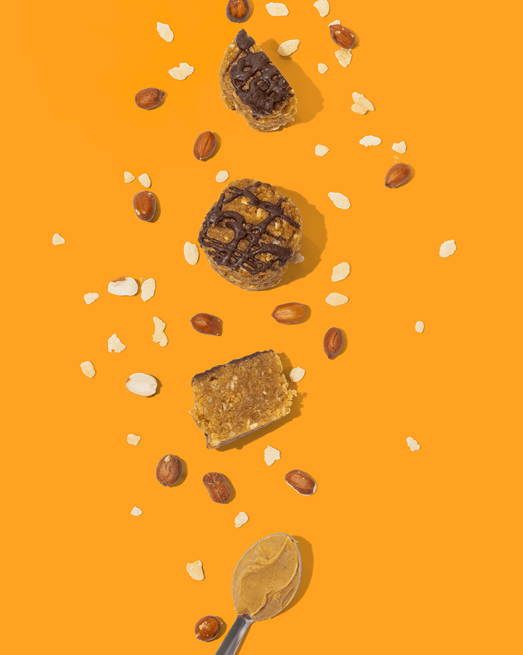Probites Peanut Butter Crunch — falling with peanuts and spoon